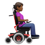 WOMAN IN MOTORIZED WHEELCHAIR FACING RIGHT (medium-dark)