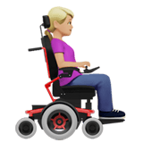 WOMAN IN MOTORIZED WHEELCHAIR FACING RIGHT (medium-light)